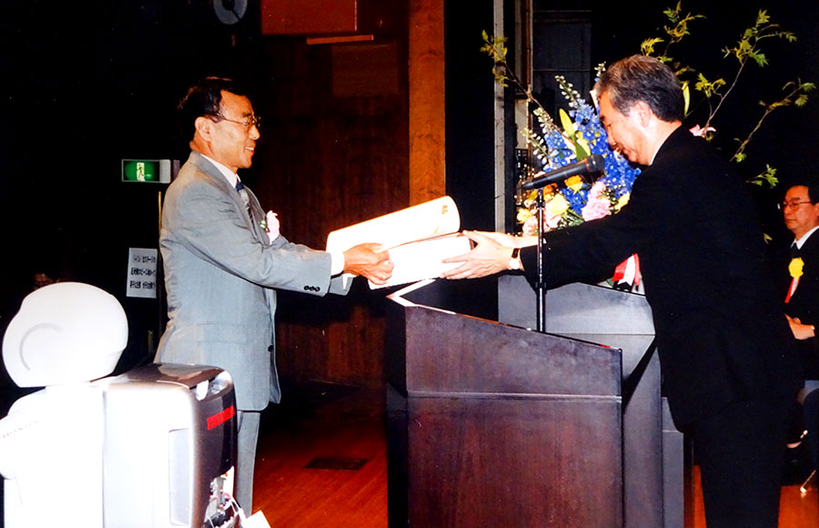 Toru Taniguchi, Representative Director - Kozo Oikawa, Director of the Patent Office